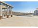Community pool and shaded seating area offers a refreshing escape on a sunny day at 2705 S Danube Way # 101, Aurora, CO 80013