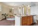 Open kitchen and dining area with stainless steel appliances and granite countertops at 10184 Park Meadows Dr # 1303, Lone Tree, CO 80124