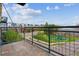 Outdoor patio featuring beautiful views of the community, including the playground, green spaces, and building exteriors at 10184 Park Meadows Dr # 1303, Lone Tree, CO 80124