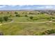 An open field provides unobstructed views for the surrounding neighborhood at 1100 Columbine Way, Erie, CO 80516