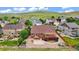 Backyard featuring a patio, a small deck, and lush landscaping, ideal for entertaining and enjoying the outdoor space at 1100 Columbine Way, Erie, CO 80516