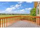 The outdoor deck offers stunning views of the surrounding valley and expansive blue skies at 1100 Columbine Way, Erie, CO 80516