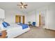 The spacious main bedroom features vaulted ceilings and an ensuite bathroom at 1100 Columbine Way, Erie, CO 80516