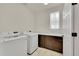 The laundry room features modern washer and dryer, and storage at 6335 E 143Rd Dr, Thornton, CO 80602