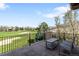Balcony area with a view of the golf course, and patio furniture at 9151 E Harvard Ave, Denver, CO 80231