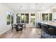 Bright dining area with large windows and convenient bar seating at 9151 E Harvard Ave, Denver, CO 80231