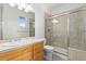 Clean bathroom with a glass shower and modern fixtures at 1199 Links Ct, Erie, CO 80516