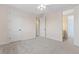 This room features a ceiling fan and two doors leading to other areas at 1199 Links Ct, Erie, CO 80516