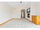 Spacious main bedroom featuring fireplace, tv, and walk-through to the main bathroom at 1199 Links Ct, Erie, CO 80516