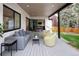 Inviting covered patio with comfortable seating, perfect for outdoor relaxation and entertaining at 62 Jasmine St, Denver, CO 80220