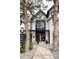 Charming home entrance with modern architectural details and beautiful landscaping at 62 Jasmine St, Denver, CO 80220