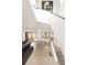 Open concept living space with modern staircase, kitchen and dining area at 62 Jasmine St, Denver, CO 80220