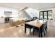 Bright, modern living space featuring an island kitchen, dining area, and comfortable seating at 62 Jasmine St, Denver, CO 80220