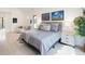 Comfortable main bedroom featuring large windows, soft lighting, and decor at 62 Jasmine St, Denver, CO 80220