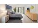 Elegant main bedroom with large windows, high ceilings, and neutral decor at 62 Jasmine St, Denver, CO 80220