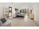 An airy main bedroom with vaulted ceilings, neutral decor, and lots of natural light at 62 Jasmine St, Denver, CO 80220