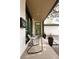 Covered front porch with stylish seating, offering a relaxing outdoor space at 62 Jasmine St, Denver, CO 80220