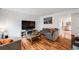 Cozy living room with hardwood floors and comfortable seating at 12956 W Virginia Ave, Lakewood, CO 80228