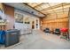 Backyard patio featuring bar seating, outdoor furniture and a grill, perfect for entertaining at 12956 W Virginia Ave, Lakewood, CO 80228