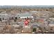 Aerial view of home in established neighborhood at 1436 S Yates St, Denver, CO 80219