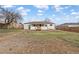 Large backyard featuring a small deck at 1436 S Yates St, Denver, CO 80219