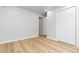 Clean bedroom with large closet and doorway to additional room at 1436 S Yates St, Denver, CO 80219
