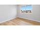 Bedroom with large windows and neutral paint, providing a relaxing ambiance at 1436 S Yates St, Denver, CO 80219