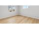 Bright bedroom with large windows and neutral paint, providing a relaxing ambiance at 1436 S Yates St, Denver, CO 80219