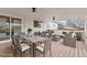 Inviting outdoor patio with dining and lounge seating, perfect for entertaining at 1436 S Yates St, Denver, CO 80219