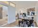 Cozy dining area with a round table, modern chairs, and stylish lighting fixtures at 4910 W 34Th Ave, Denver, CO 80212