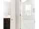 En suite primary bedroom with view of bathroom and walk-in closet at 5025 Central Park Blvd, Denver, CO 80238