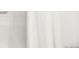 Bright bathroom shower with white tile and white shower curtain at 5025 Central Park Blvd, Denver, CO 80238