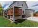 Backyard area featuring a hot tub, deck, and privacy lattice for outdoor enjoyment at 6119 Zenobia Ct, Arvada, CO 80003