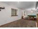 Spacious finished basement featuring carpet, windows, and a pool table covered in green felt at 6119 Zenobia Ct, Arvada, CO 80003