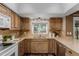 Well-designed kitchen with stainless steel appliances and plenty of counter space at 6119 Zenobia Ct, Arvada, CO 80003