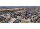 Aerial view of a suburban neighborhood with well-maintained homes, tree-lined streets, and mountain views at 616 N Brentwood Ct, Castle Rock, CO 80104