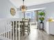 Dining area with backyard view, chandelier, and access to the kitchen, perfect for entertaining at 616 N Brentwood Ct, Castle Rock, CO 80104
