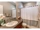 Bathroom with tub shower, vanity, and updated fixtures at 3912 Trail Stone Cir, Castle Rock, CO 80108