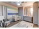 Bedroom with crib, dresser, and charming wall decor at 3912 Trail Stone Cir, Castle Rock, CO 80108