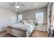 Bright bedroom featuring a comfortable bed and ample natural light at 3912 Trail Stone Cir, Castle Rock, CO 80108