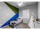 bedroom with a twin bed and playful wall art at 3912 Trail Stone Cir, Castle Rock, CO 80108