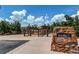 Dog park with fenced area and stone entrance sign at 3912 Trail Stone Cir, Castle Rock, CO 80108