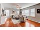 Spacious living room showcasing hardwood floors and a cozy seating arrangement at 3912 Trail Stone Cir, Castle Rock, CO 80108
