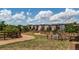 Community park with walking path and homes in the background at 3912 Trail Stone Cir, Castle Rock, CO 80108