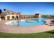 Community pool with a separate shallow area for children at 3912 Trail Stone Cir, Castle Rock, CO 80108