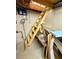 Basement ladder with wood framing, near electrical components and storage at 33606 Gap Rd, Golden, CO 80403