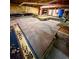 Unfinished basement with concrete floors featuring area rugs at 33606 Gap Rd, Golden, CO 80403