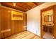 A bedroom area with hardwood floors and an open bathroom concept at 33606 Gap Rd, Golden, CO 80403