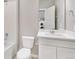 Clean bathroom features a tiled shower, a white vanity, and modern fixtures at 27534 E Byers Ave, Aurora, CO 80018