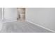 An empty bedroom with neutral walls and carpeting, ready to be personalized at 27534 E Byers Ave, Aurora, CO 80018